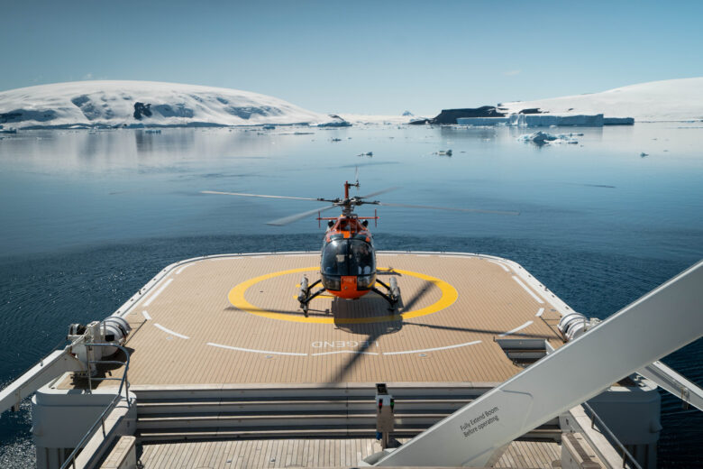 Superyacht Legend and helicopter in Antarctica. Photo: Shelton DuPreez.