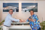 Berkay Yilmaz of Bilgin yachts (left) shakes hands with John Staluppi over Project Bond.